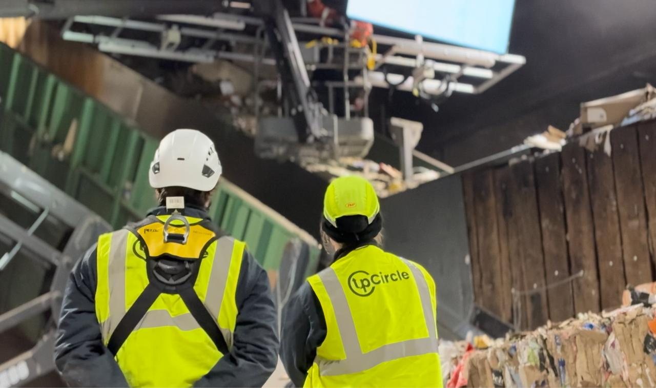 UpCircle engineers inspecting a recovered paper intake at a paper mill