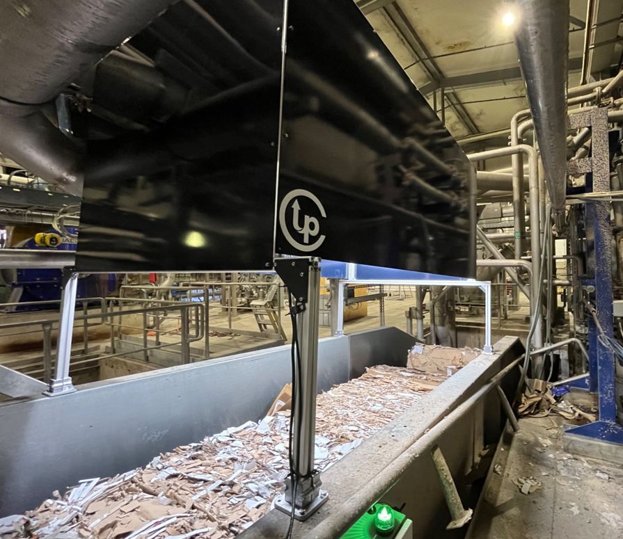 UpCircle™ Station sensor unit mounted above a recovered paper feeding conveyor