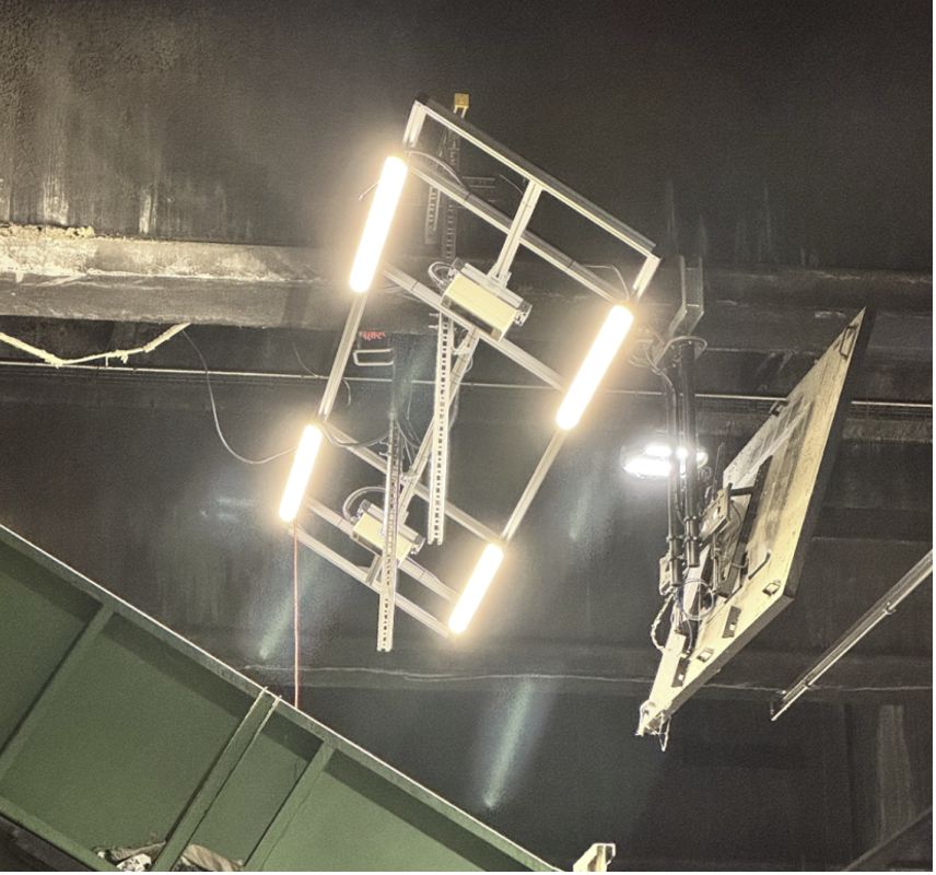UpCircle™ Station lighting and sensor frame above a double conveyor