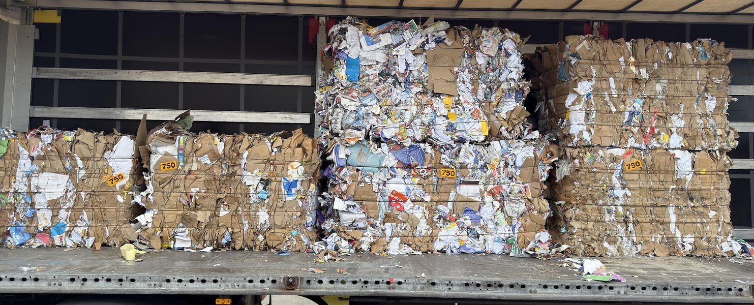 Truck with recovered paper bales at delivery